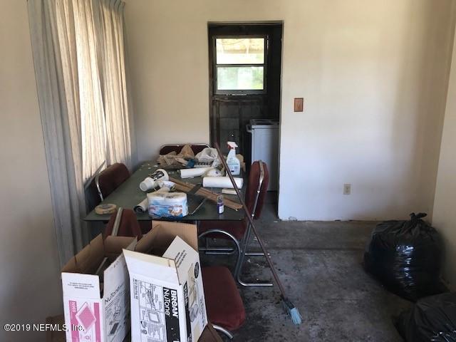 6153 Colgate Road Jacksonville, FL 32217 - Photo 4 of 25 a room with furniture and window
