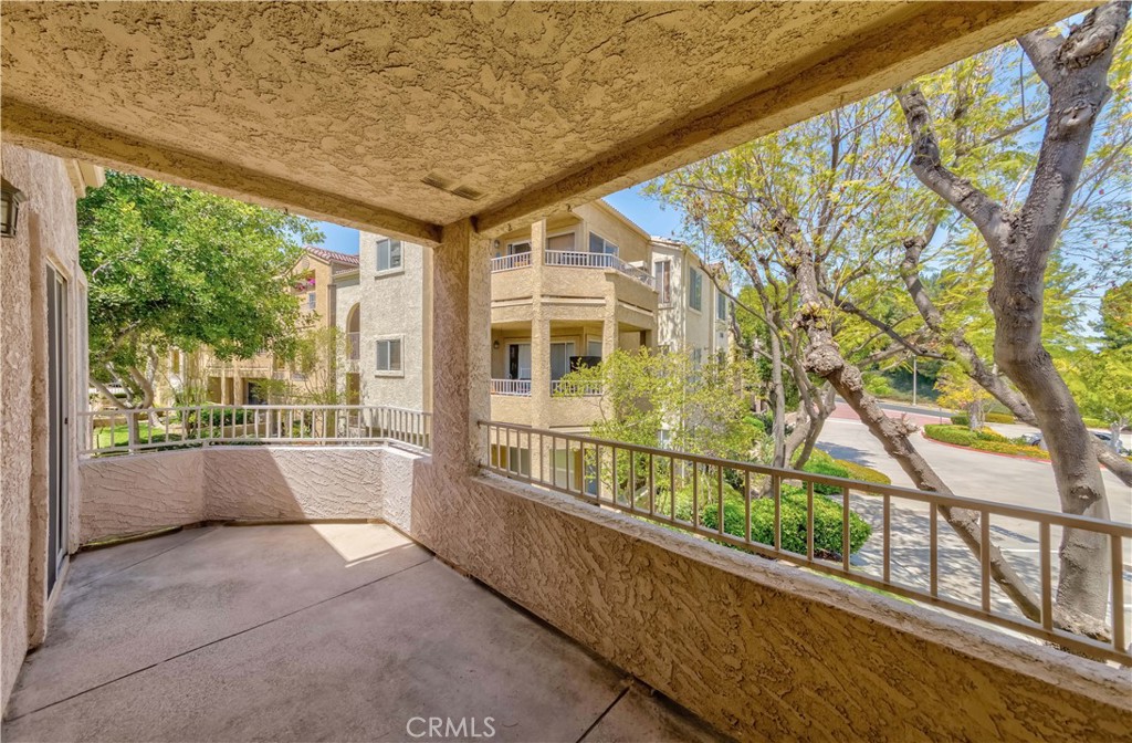 2400 Del Mar Way, Unit 207 Corona, CA 92882 - Photo 20 of 20 a view of a large building from a balcony