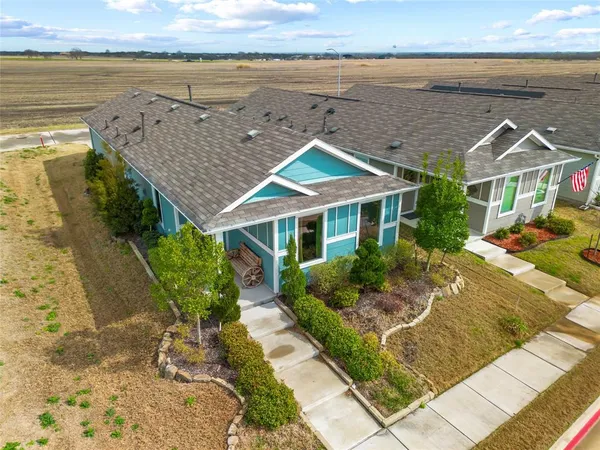 a front view of house with ocean view