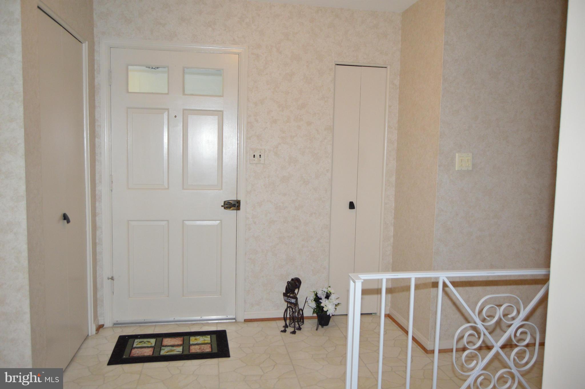 12910 Ruxton Road Silver Spring, MD 20904 - Photo 3 of 30 a view of walk in closet with clothes