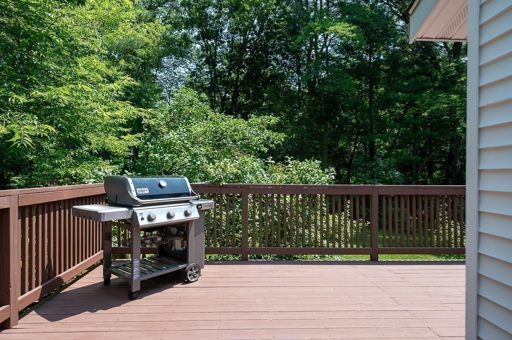 12 Sycamore Road Sudbury, MA 01776 - Photo 30 of 38 a view of balcony with wooden floor and outdoor seating