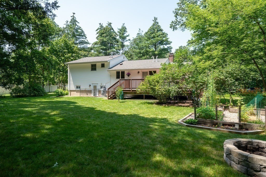 12 Sycamore Road Sudbury, MA 01776 - Photo 38 of 38 a front view of a house with garden