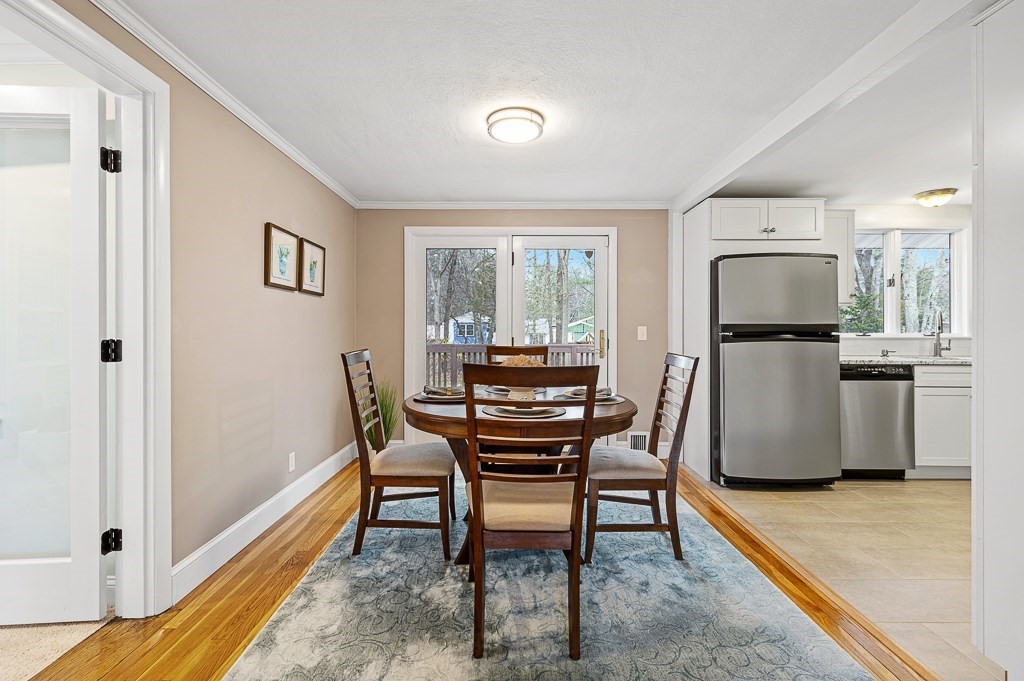 12 Sycamore Road Sudbury, MA 01776 - Photo 8 of 38 a dining room with furniture and window