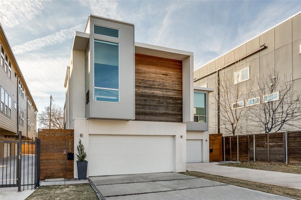 a view of a house with a door and a window