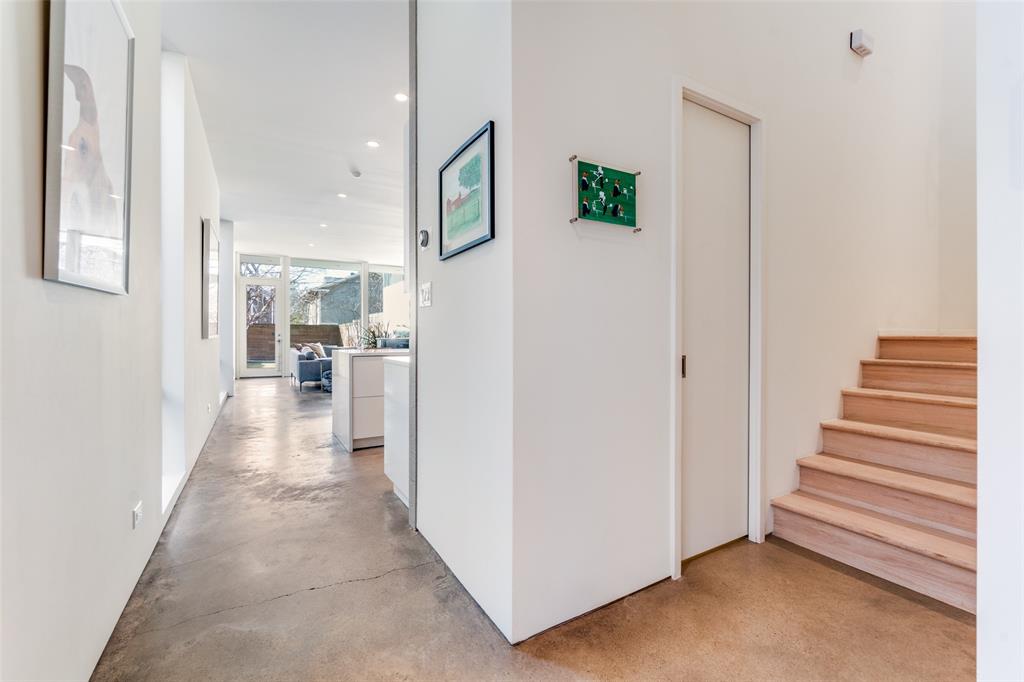 5804 Bryan Parkway Dallas, TX 75206 - Photo 13 of 25 a view of a hallway with wooden floor and entryway