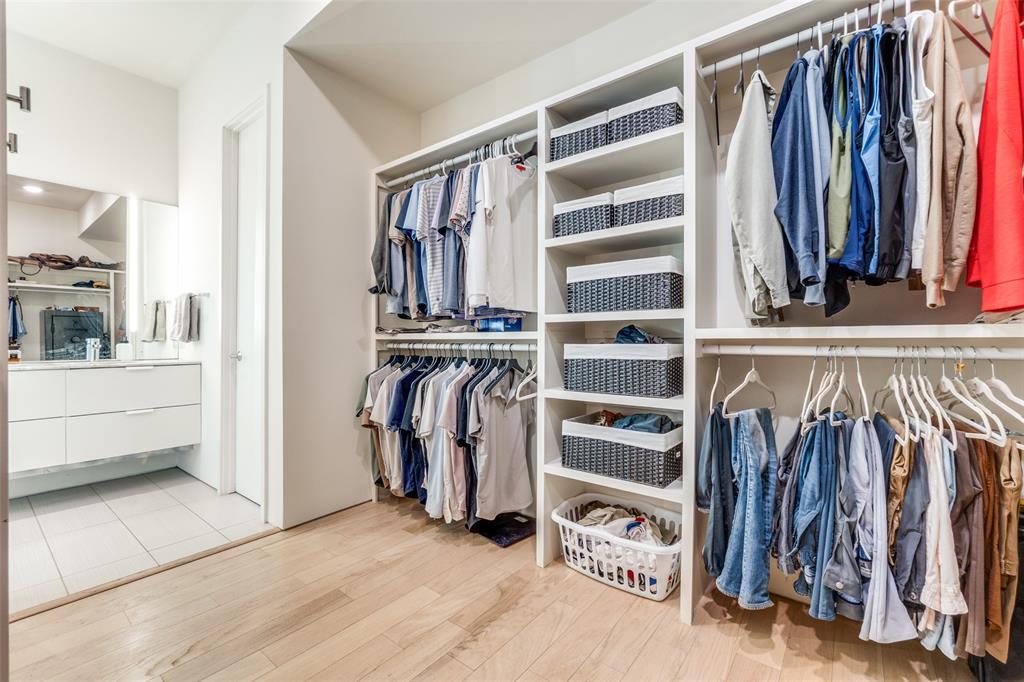 5804 Bryan Parkway Dallas, TX 75206 - Photo 19 of 25 a view of walk in closet with clothes and shoes