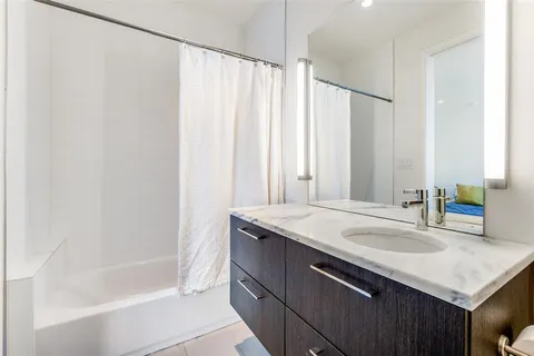 a bathroom with a sink and a bathtub