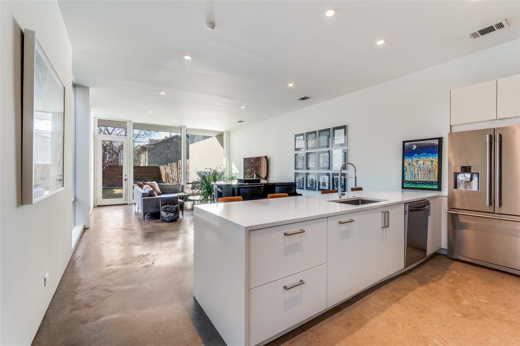 5804 Bryan Parkway Dallas, TX 75206 - Photo 6 of 25 a kitchen with sink cabinets and refrigerator