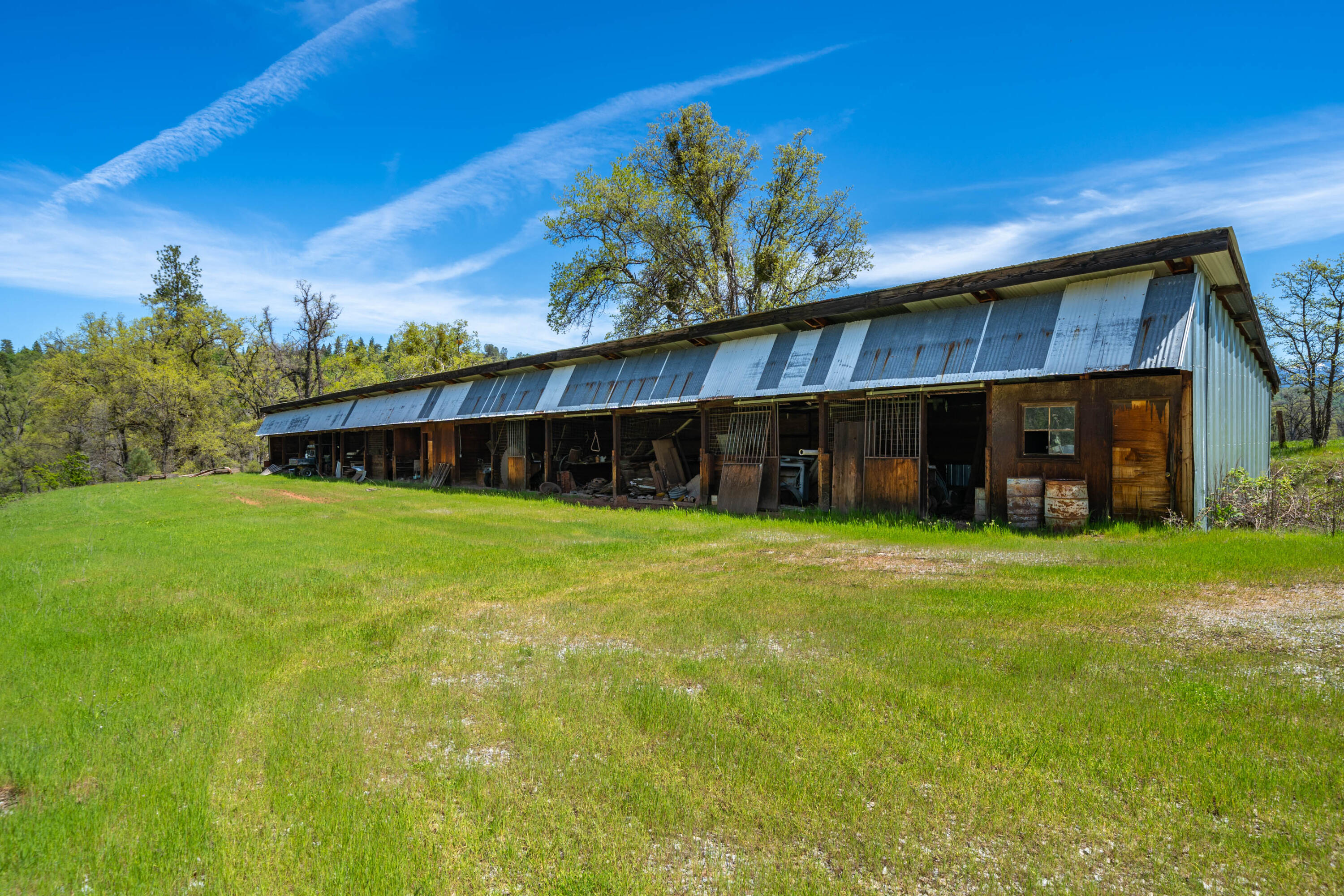 9568 Blue Mountain Ranch Road Whitmore, CA 96096 - Photo 26 of 93 a front view of a house with a yard