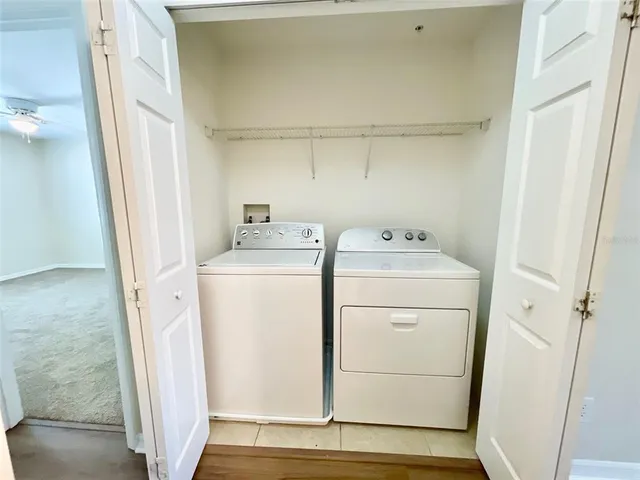a utility room with dryer and washer