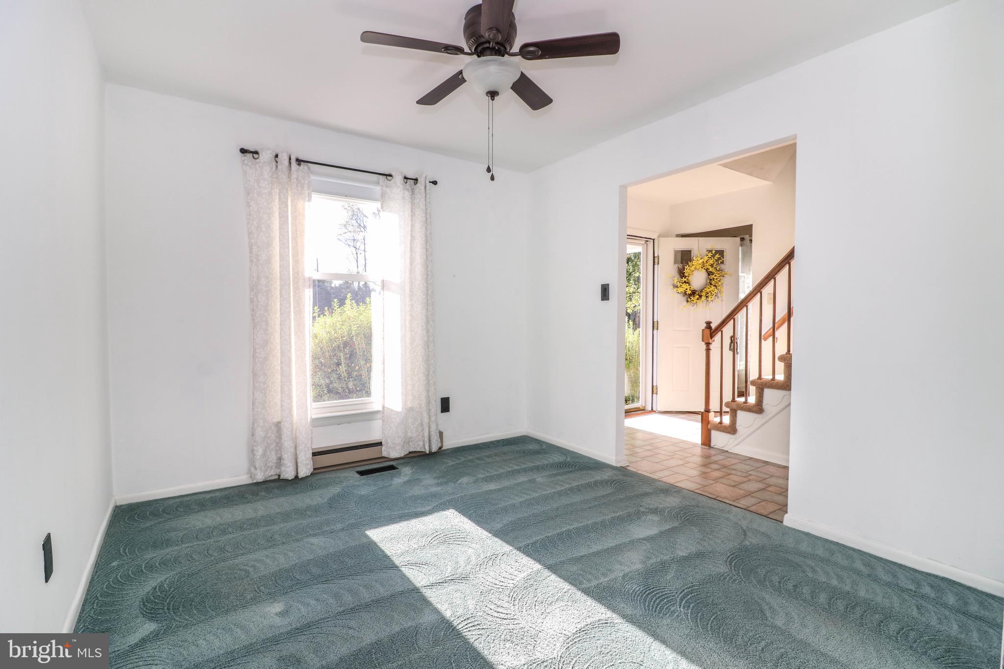 3309 Miller Road Pennsburg, PA 18073 - Photo 22 of 45 Formal Dining Room with Lighted Ceiling Fan
