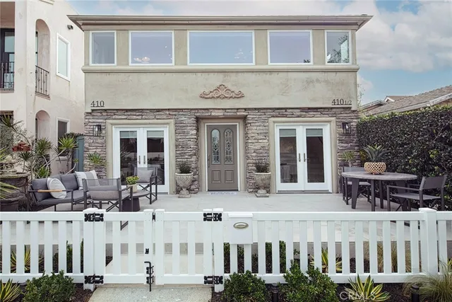a front view of a building with glass windows