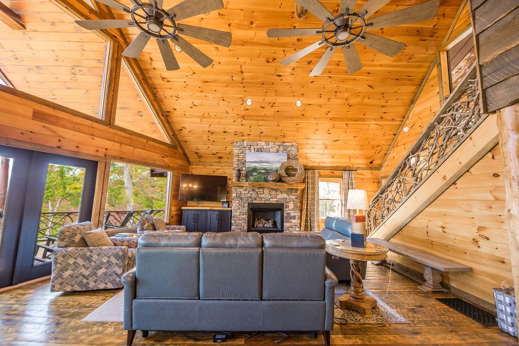 576 Century Blue Ridge Blue Ridge, GA 30513 - Photo 11 of 71 a living room with furniture a fireplace and a table