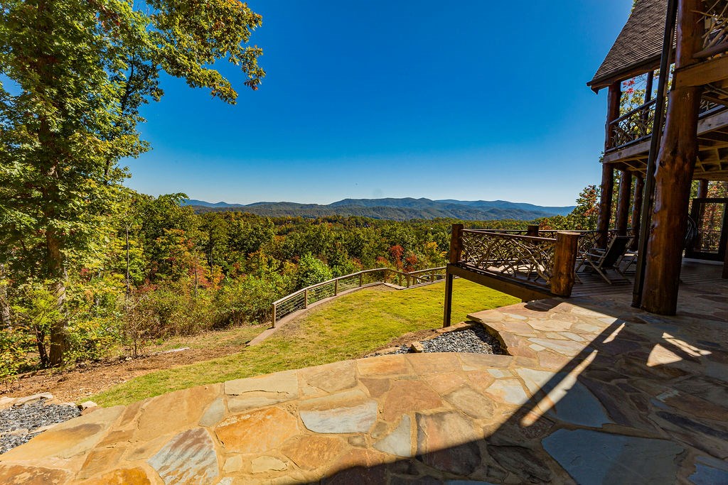 576 Century Blue Ridge Blue Ridge, GA 30513 - Photo 53 of 71 a view of a swimming pool with a table and chairs