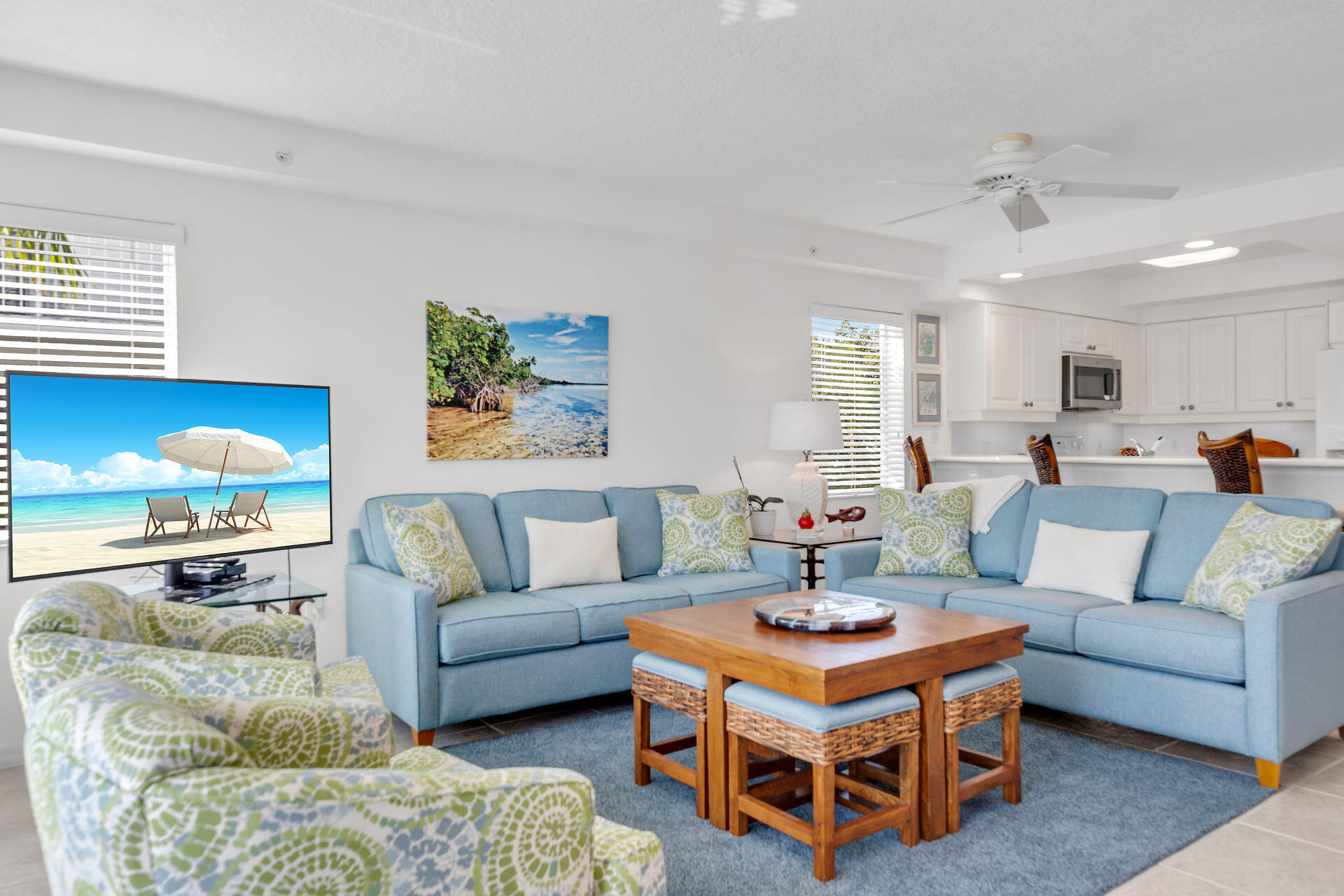 95 Coco Plum Drive, Unit 5A Marathon, FL 33050 - Photo 6 of 34 a living room with furniture a rug and a window