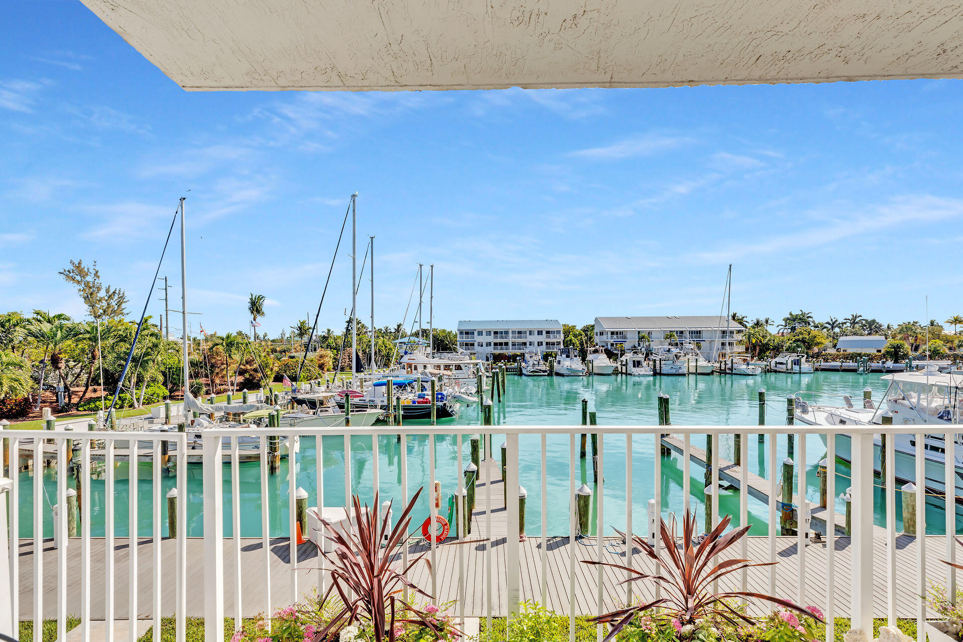 95 Coco Plum Drive, Unit 5A Marathon, FL 33050 - Photo 9 of 34 a view of lake from a balcony with outdoor space