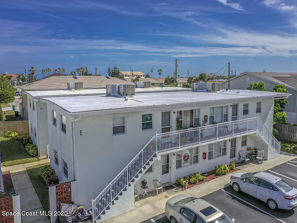 651 Palm Drive, Unit E1 Satellite Beach, FL 32937 - Photo 2 of 18 a view of a balcony with residential house