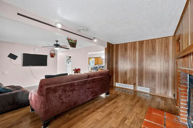 a bed room with a bed and a television