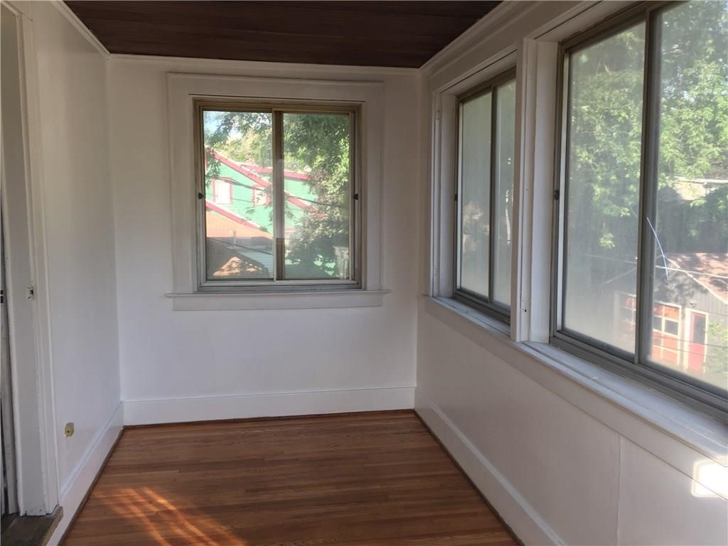 93 Scottsville Road Rochester, NY 14611 - Photo 12 of 17 2nd floor enclosed porch