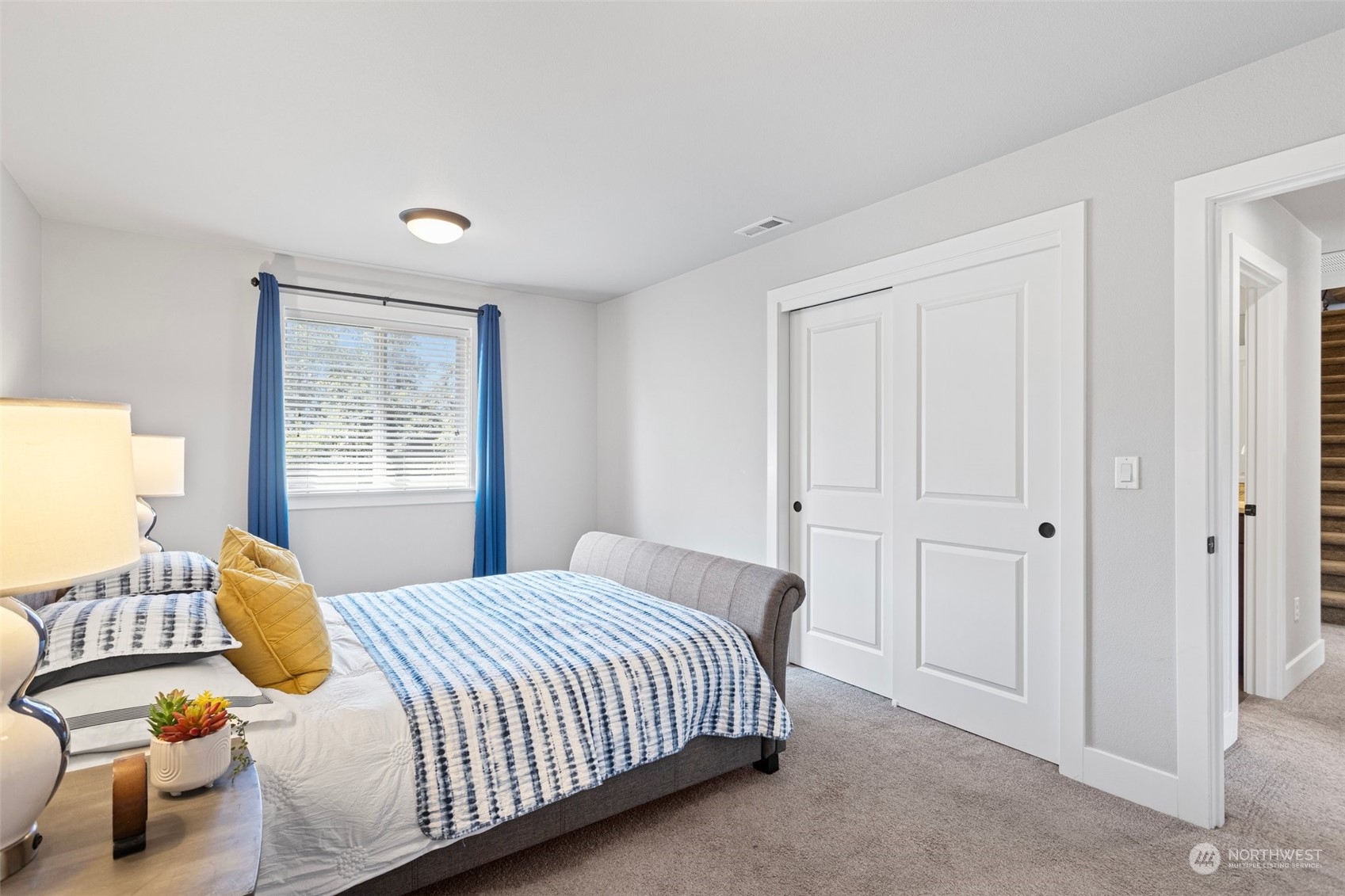 11317 Southeast 162nd Street Renton, WA 98055 - Photo 28 of 33 a bedroom with a bed and a window