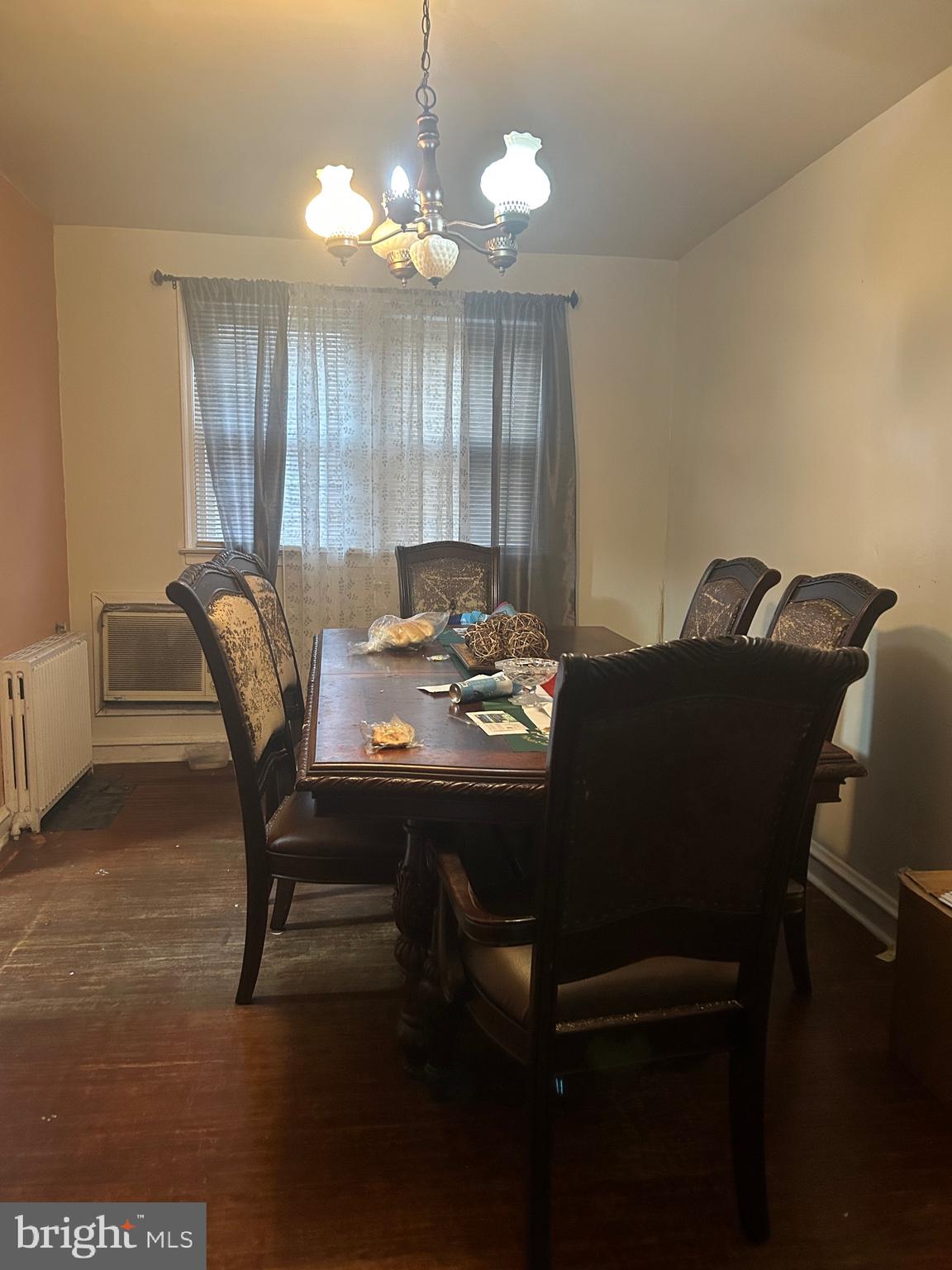 5331 Tabor Avenue Philadelphia, PA 19120 - Photo 11 of 18 a view of a dining room with furniture and chandelier