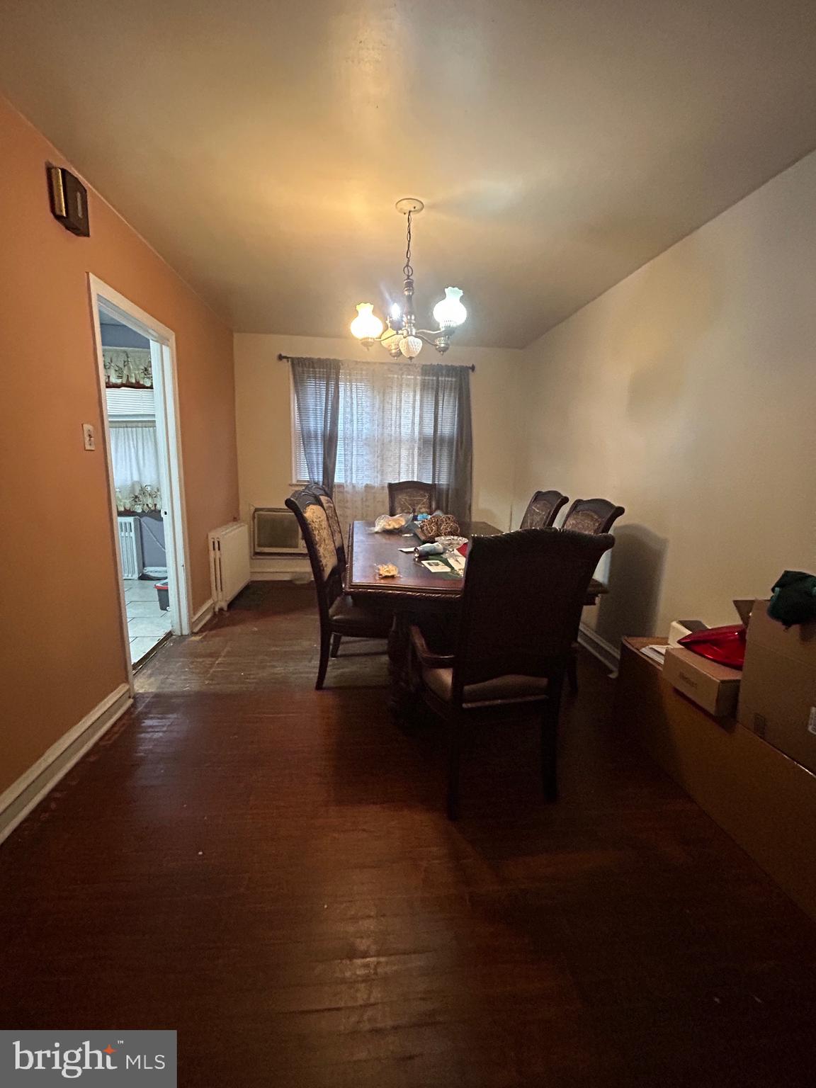 5331 Tabor Avenue Philadelphia, PA 19120 - Photo 12 of 18 a dining room with furniture and chandelier