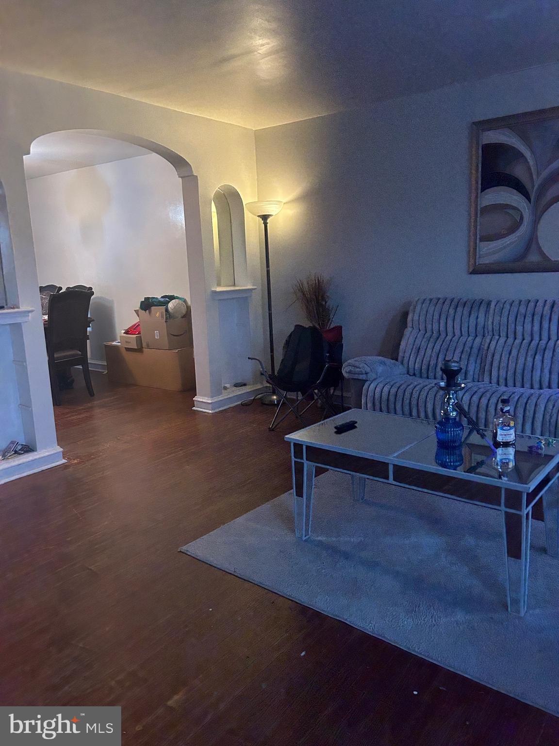 5331 Tabor Avenue Philadelphia, PA 19120 - Photo 4 of 18 a living room with furniture and a potted plant