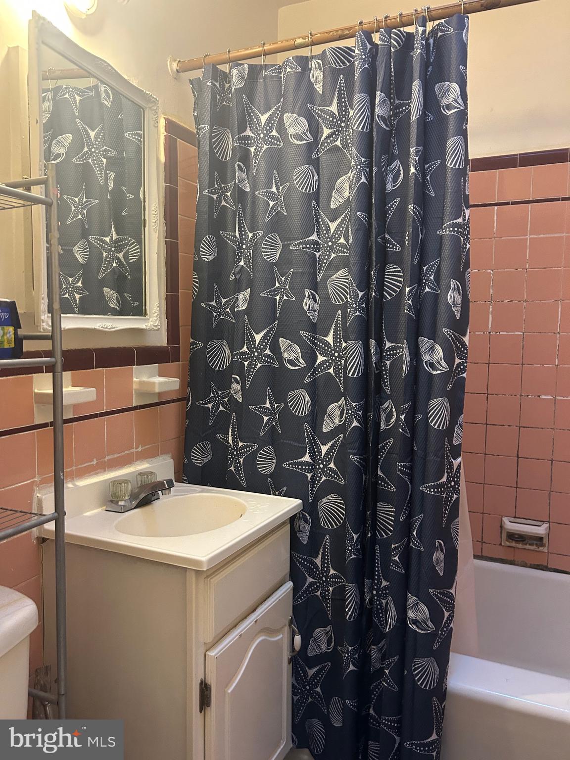 5331 Tabor Avenue Philadelphia, PA 19120 - Photo 6 of 18 a bathroom with a sink toilet and shower