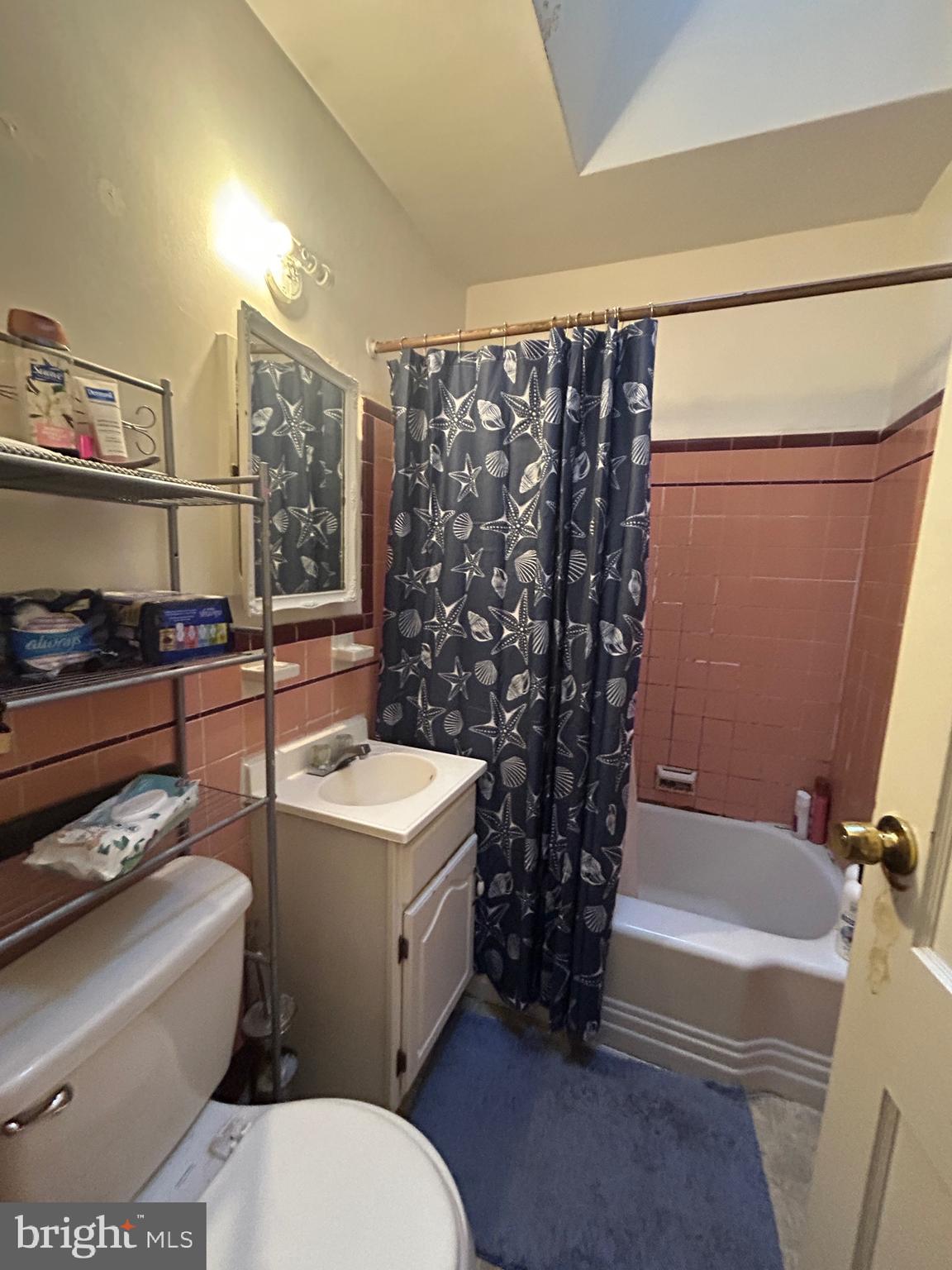 5331 Tabor Avenue Philadelphia, PA 19120 - Photo 7 of 18 a bathroom with a sink toilet and shower