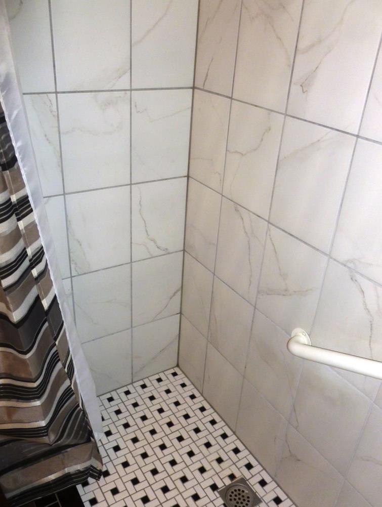 84136 Ave 44, Unit 58 Indio, CA 92203 - Photo 30 of 61 a bathroom with a shower