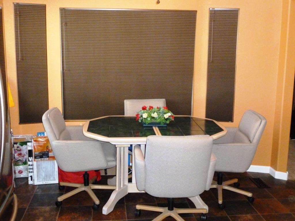 84136 Ave 44, Unit 58 Indio, CA 92203 - Photo 37 of 61 a dining room with furniture and wooden floor