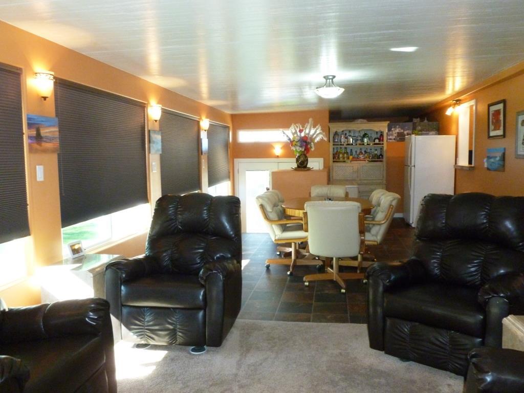 84136 Ave 44, Unit 58 Indio, CA 92203 - Photo 43 of 61 a living room with furniture and a large window
