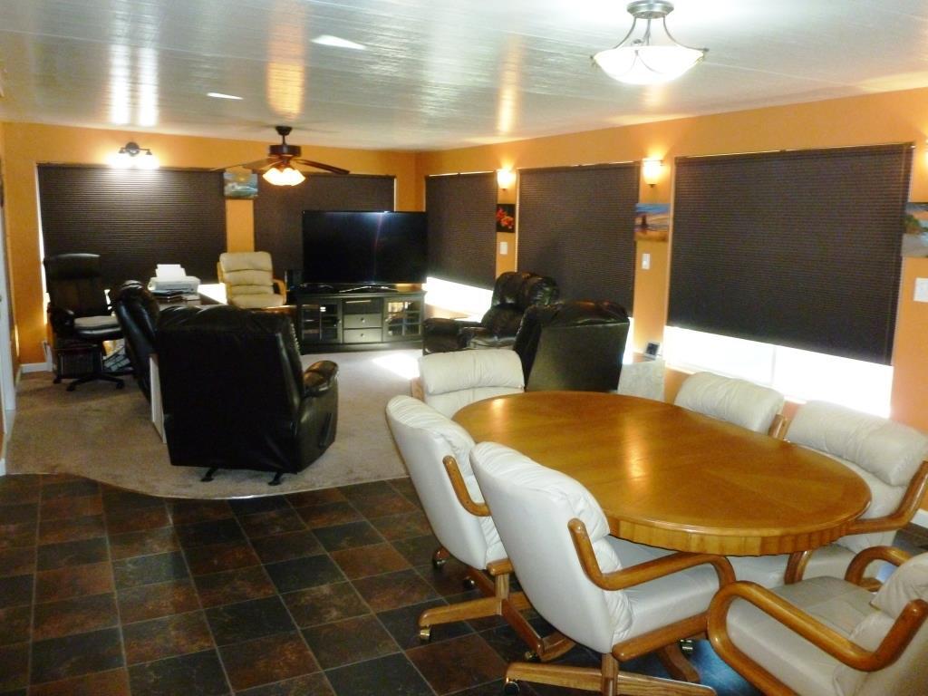 84136 Ave 44, Unit 58 Indio, CA 92203 - Photo 45 of 61 a living room with a table and chairs