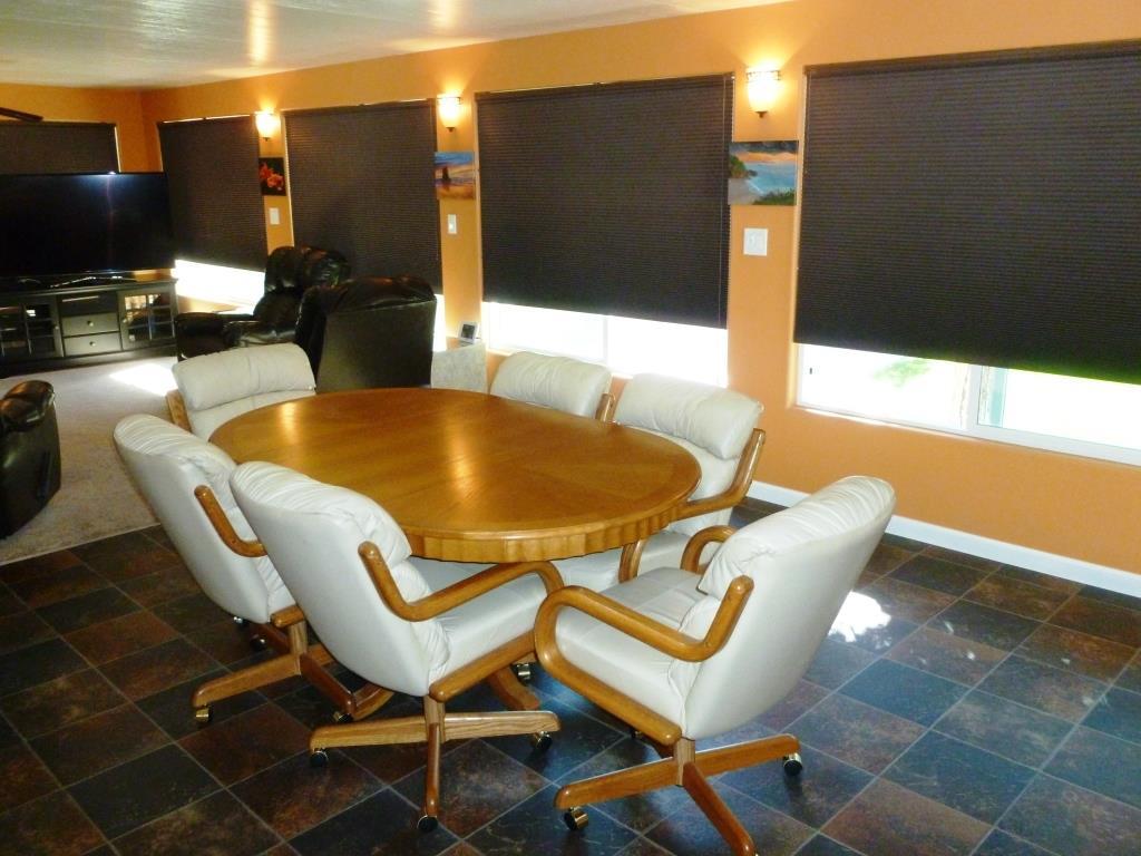 84136 Ave 44, Unit 58 Indio, CA 92203 - Photo 48 of 61 a blue swimming pool with outdoor seating and yard