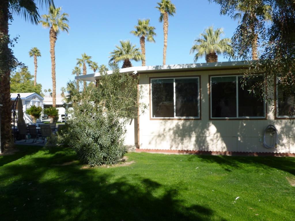 84136 Ave 44, Unit 58 Indio, CA 92203 - Photo 5 of 61 a view of house with backyard and garden