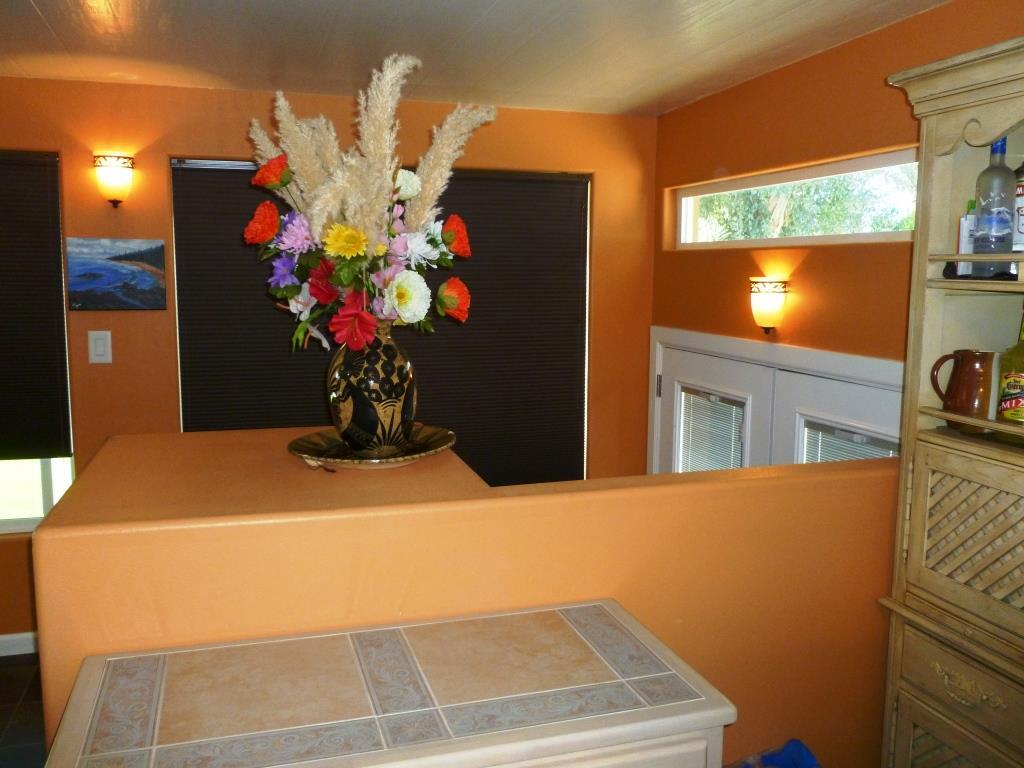 84136 Ave 44, Unit 58 Indio, CA 92203 - Photo 52 of 61 a vase of flowers sitting on a table