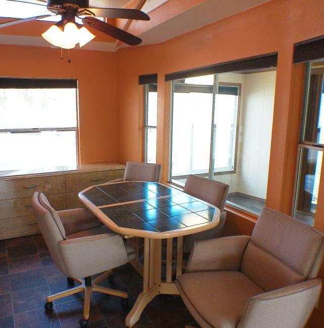 84136 Ave 44, Unit 58 Indio, CA 92203 - Photo 60 of 61 a view of a dining room with furniture window and outside view