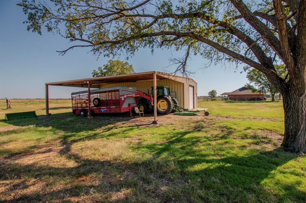 831 Baker Road Tioga, TX 76271 - Photo 19 of 27 a car parked in front of a house