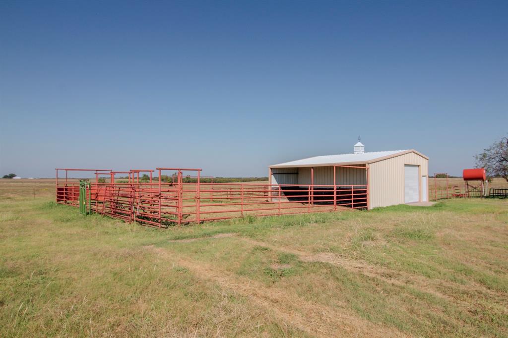 831 Baker Road Tioga, TX 76271 - Photo 21 of 27 a view of a big room with table and chairs