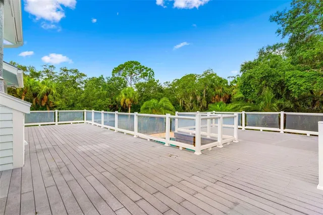 a view of a chairs and table on the wooden floor