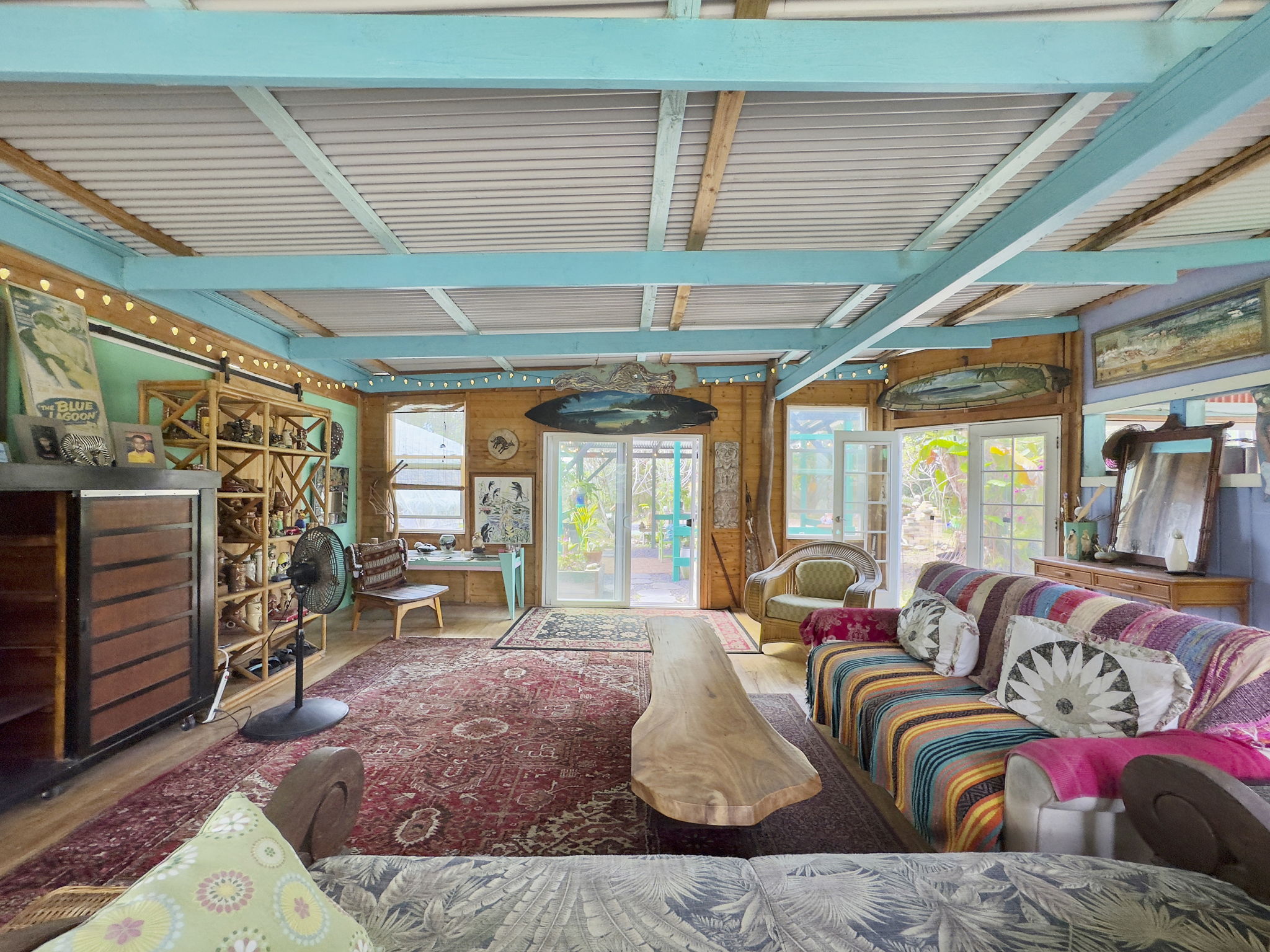 92-1347 Rd To The Sea Ocean View, HI 96704 - Photo 12 of 30 a living room with furniture