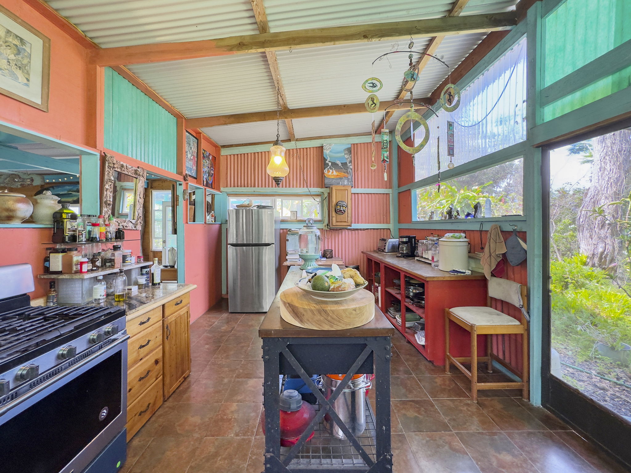 92-1347 Rd To The Sea Ocean View, HI 96704 - Photo 13 of 30 a view of an outdoor space