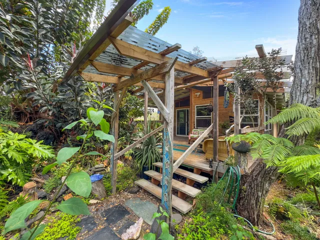 a backyard of a house with lots of green space