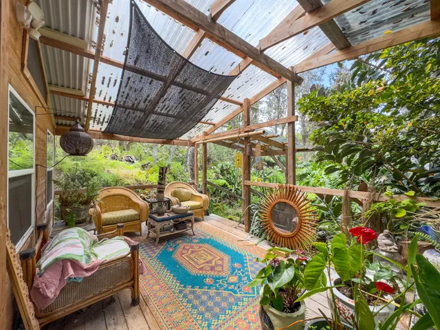 a view of yard with furniture