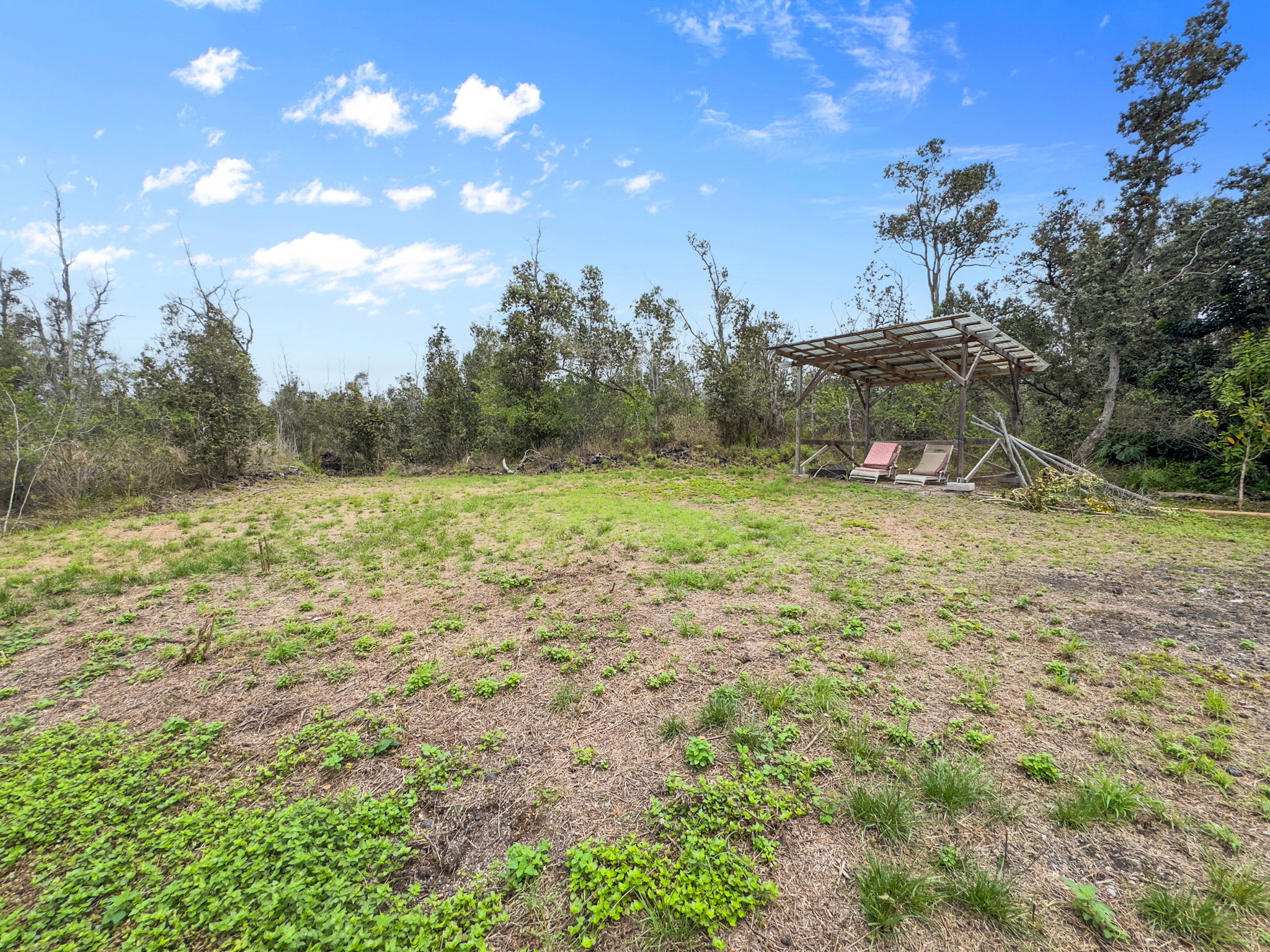 92-1347 Rd To The Sea Ocean View, HI 96704 - Photo 30 of 30 a view of a field with an trees