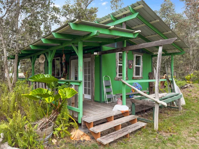 a house view with a garden space