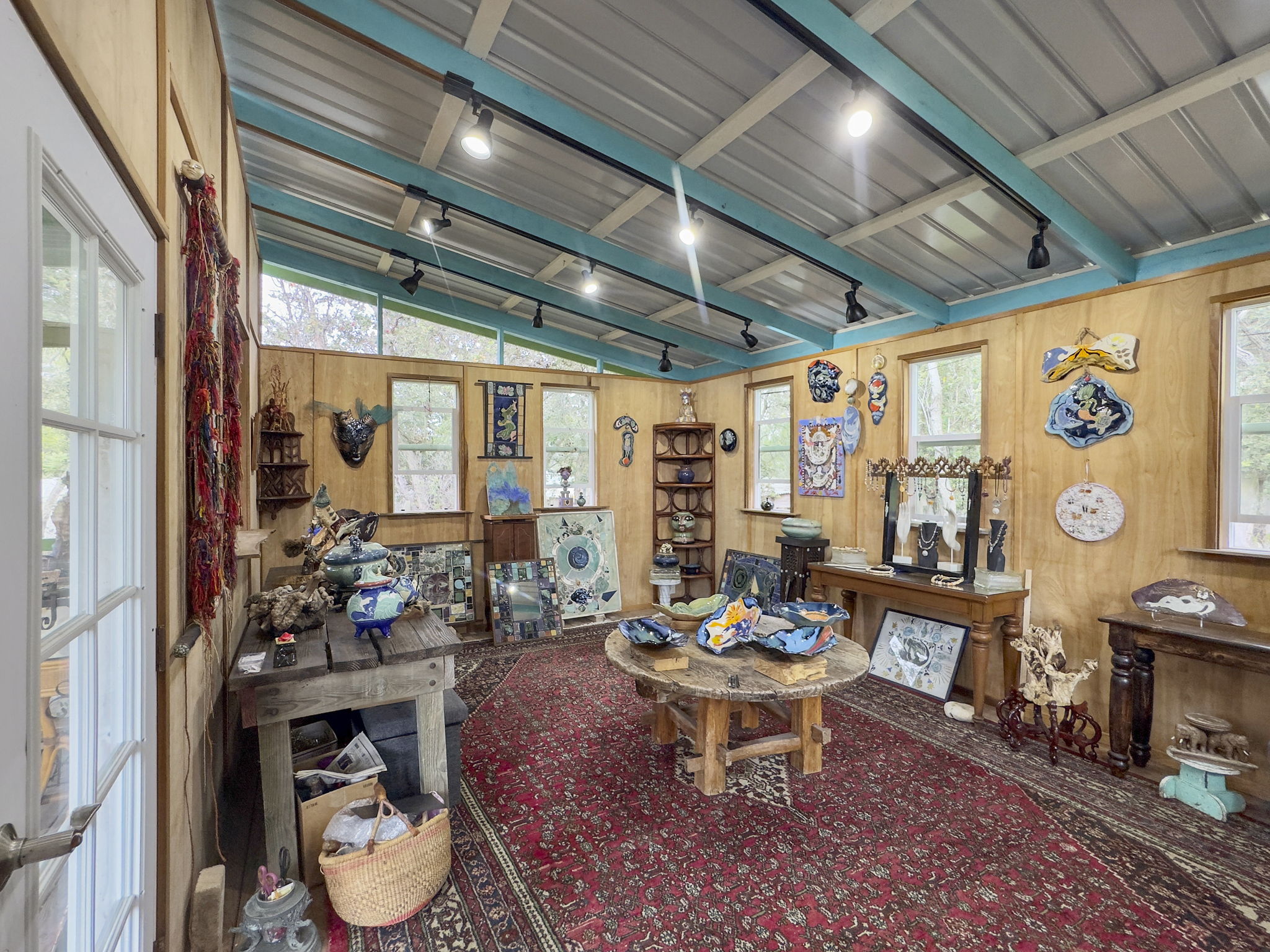 92-1347 Rd To The Sea Ocean View, HI 96704 - Photo 10 of 30 a outdoor room with lots of furniture and a potted plant