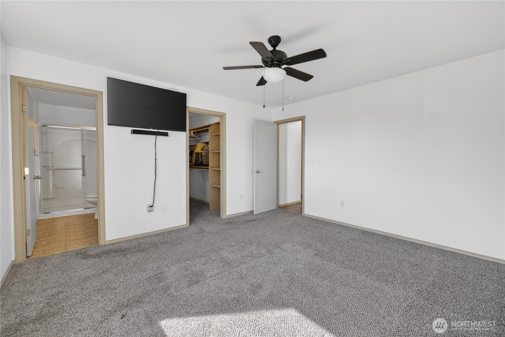 4607 Santa Fe Lane Pasco, WA 99301 - Photo 16 of 28 a view of empty room with wooden floor and ceiling fan