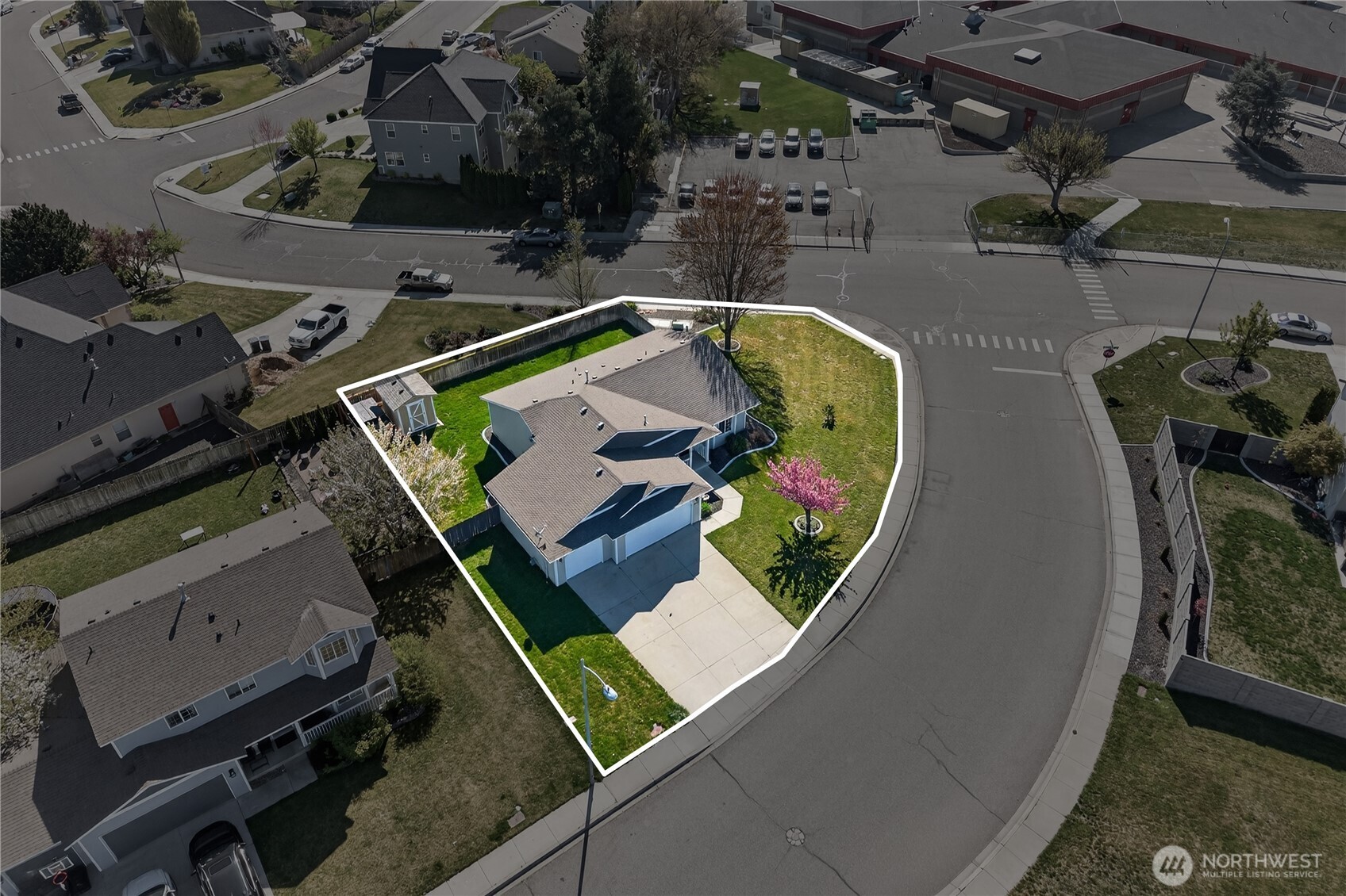 4607 Santa Fe Lane Pasco, WA 99301 - Photo 24 of 28 an aerial view of a house with a swimming pool