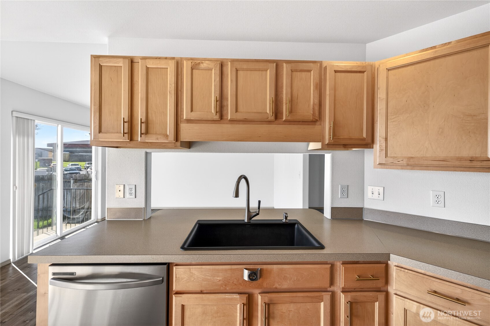 4607 Santa Fe Lane Pasco, WA 99301 - Photo 8 of 28 a kitchen with a sink and a window